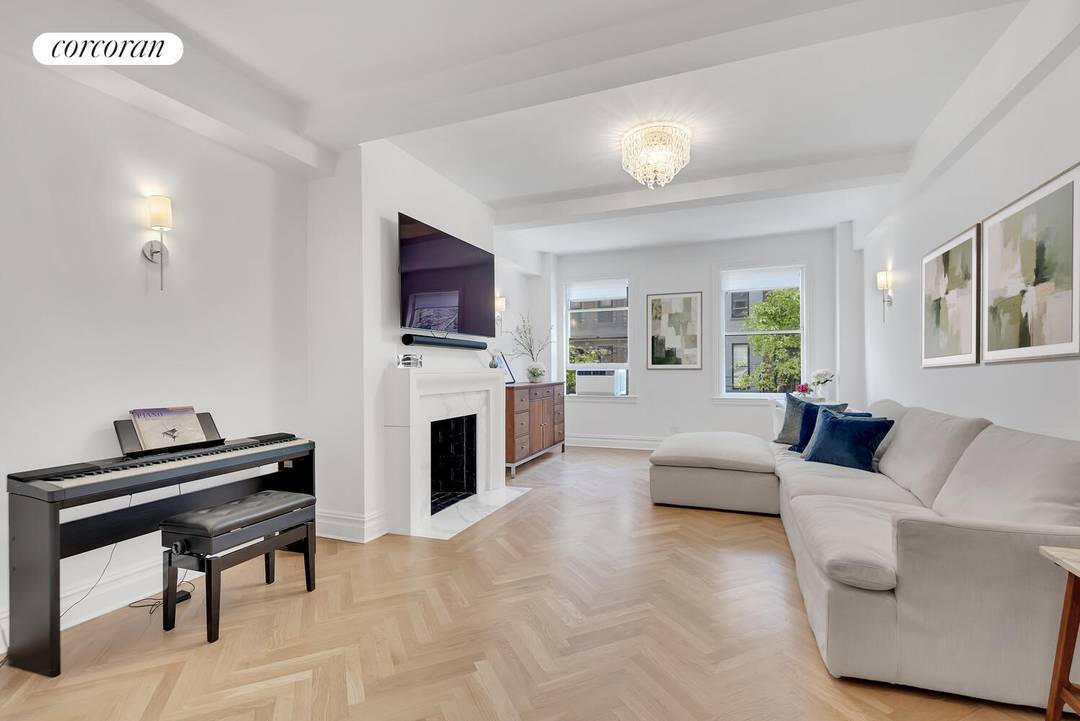 This meticulously triple mint renovated 3 bedroom, 2 bath home harmoniously blends pre war charm with modern sophistication.