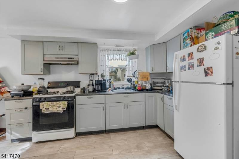 Located at 13 23 Allen Street in Passaic, this well maintained townhouse offers the perfect combination of space, convenience, and accessibility in one of Passaic County's most commuter friendly locations.