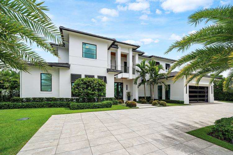 Experience the pinnacle of luxury living in this magnificent 2024 built masterpiece, perfectly positioned on one of the most prestigious streets in Lake Ida, Delray Beach.