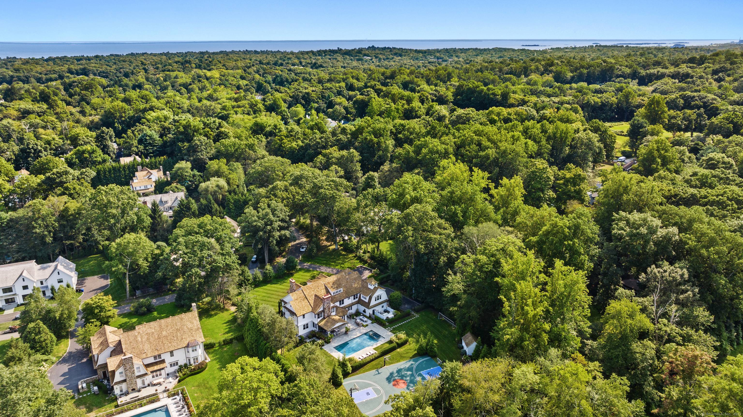 Masterfully crafted by Mattera Construction, this 12, 000 sq ft residence sits on 1.