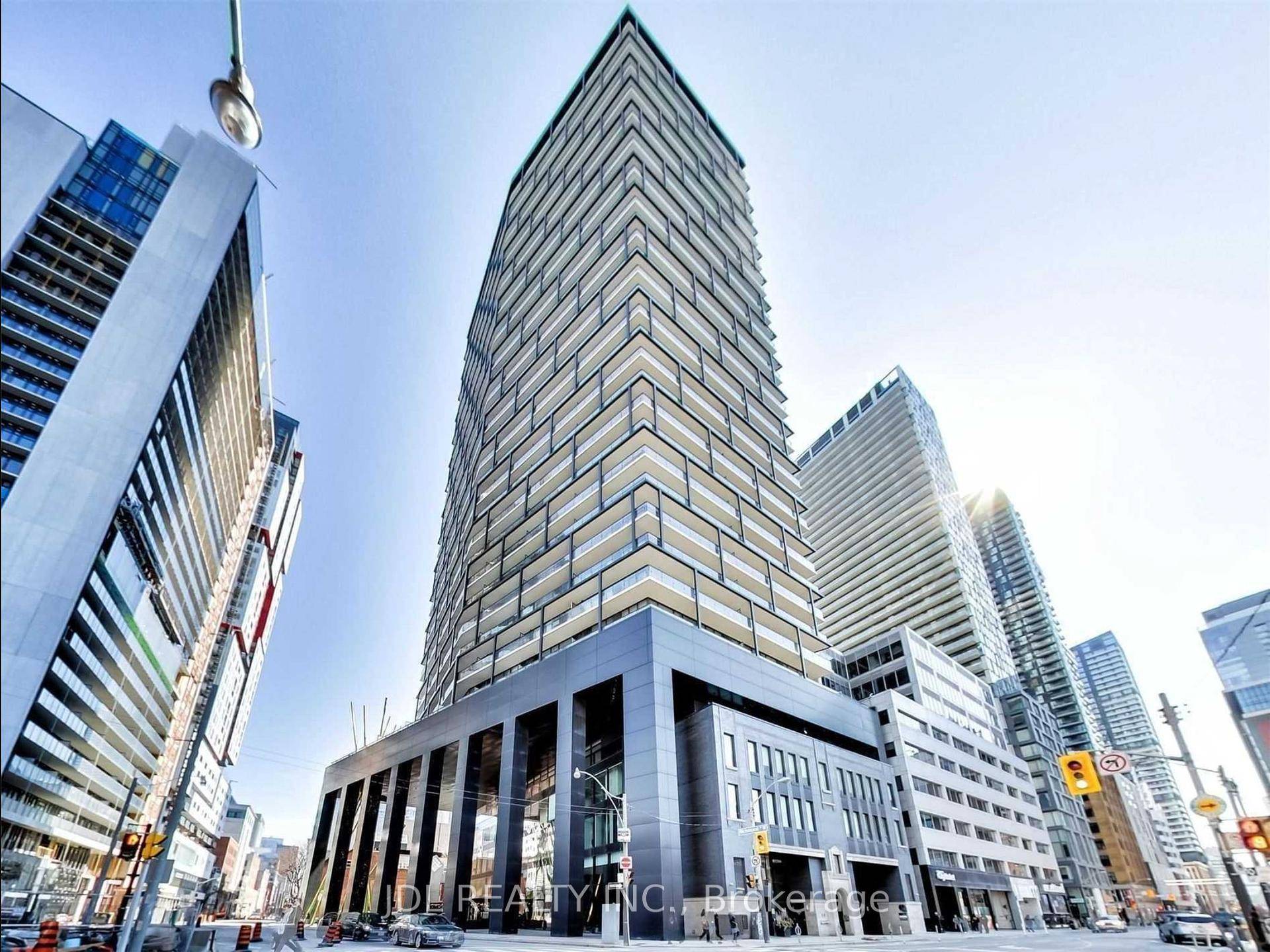 Discover this stunning corner unit featuring 3 bedrooms and a 365 sq ft wrap around balcony, perfectly situated in the heart of the city.