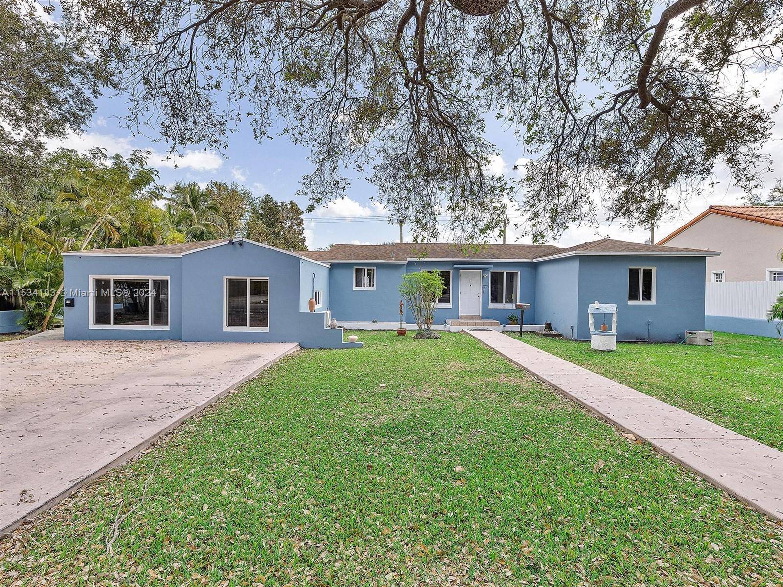 Welcome to your own slice of paradise in Miami Springs !