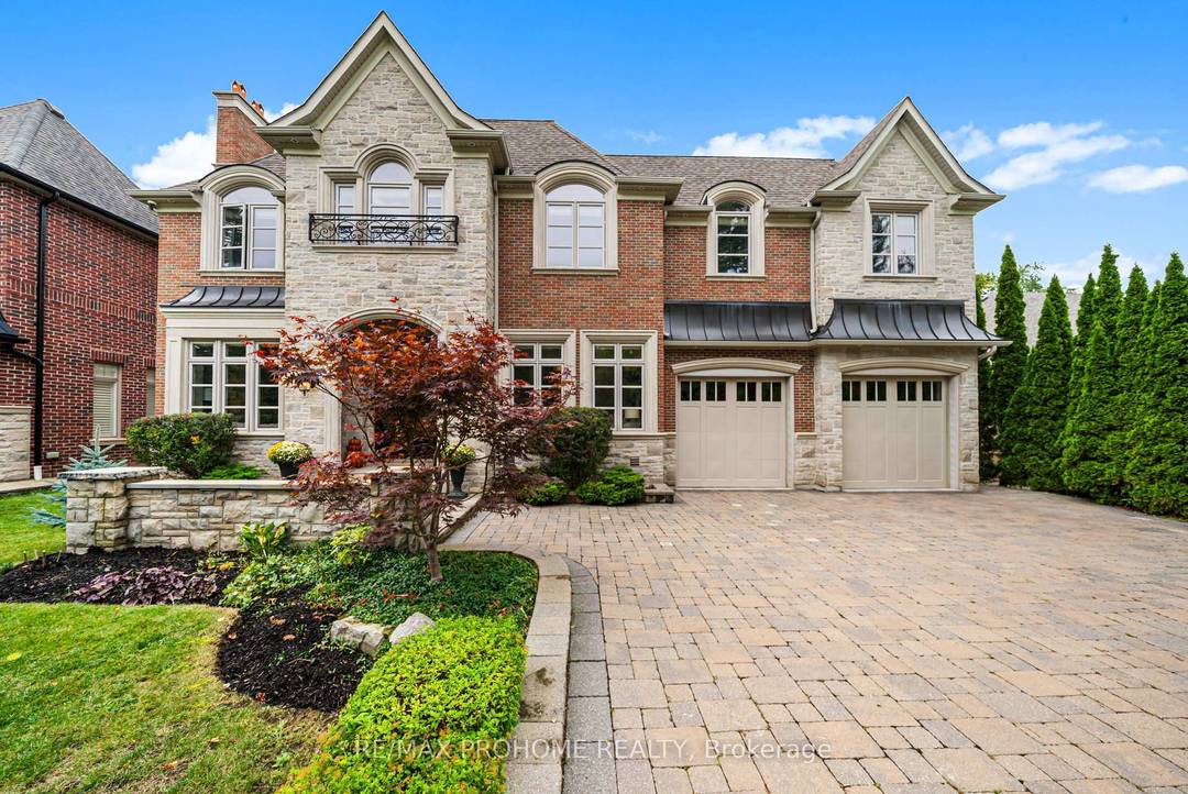 Impeccably designed 5 bedroom home set on a rare 75ft wide lot, offering approx.