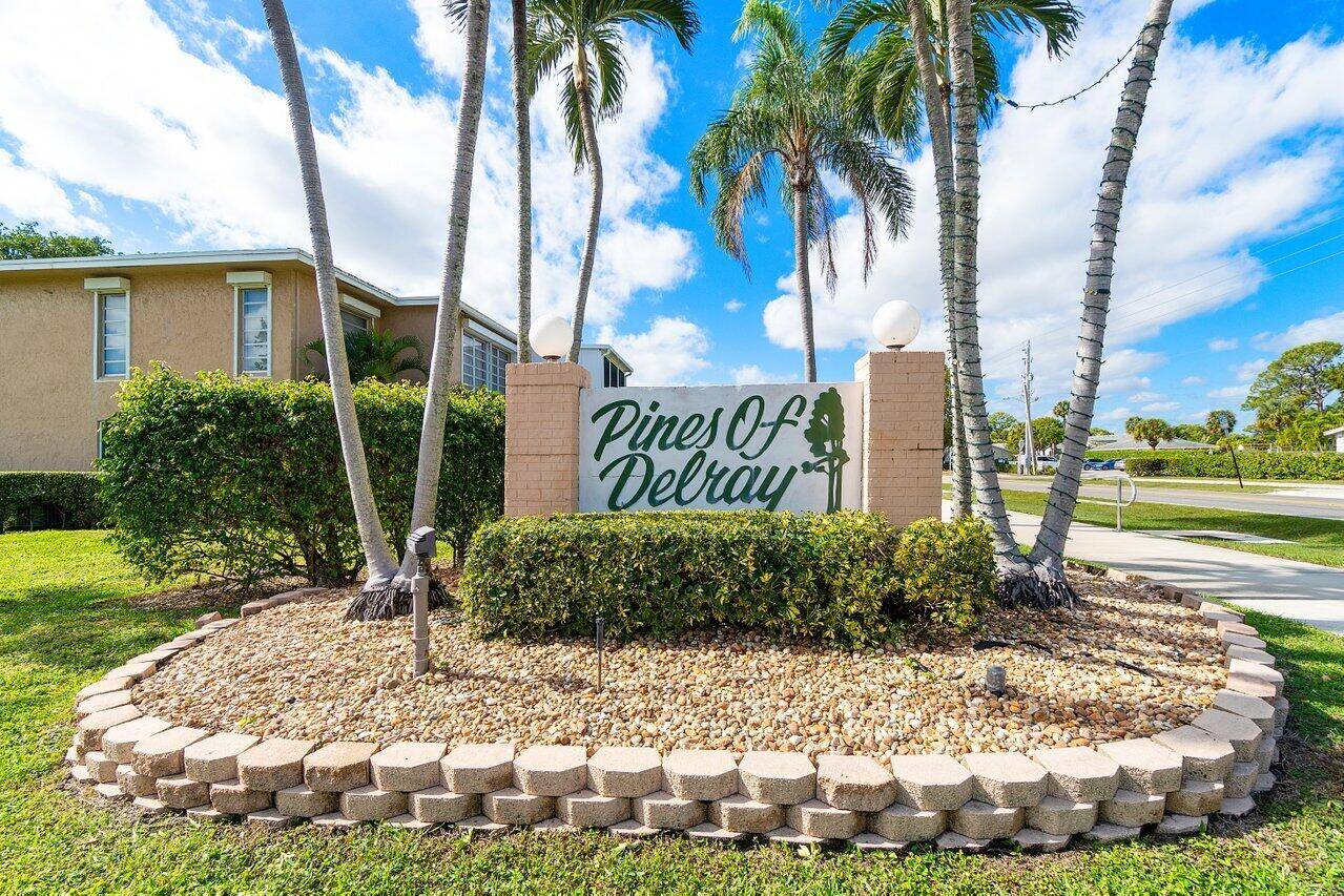 Embrace easy living in this delightful 2 bedroom, 2 bathroom condo in highly desirable 55 community of Delray Pines.