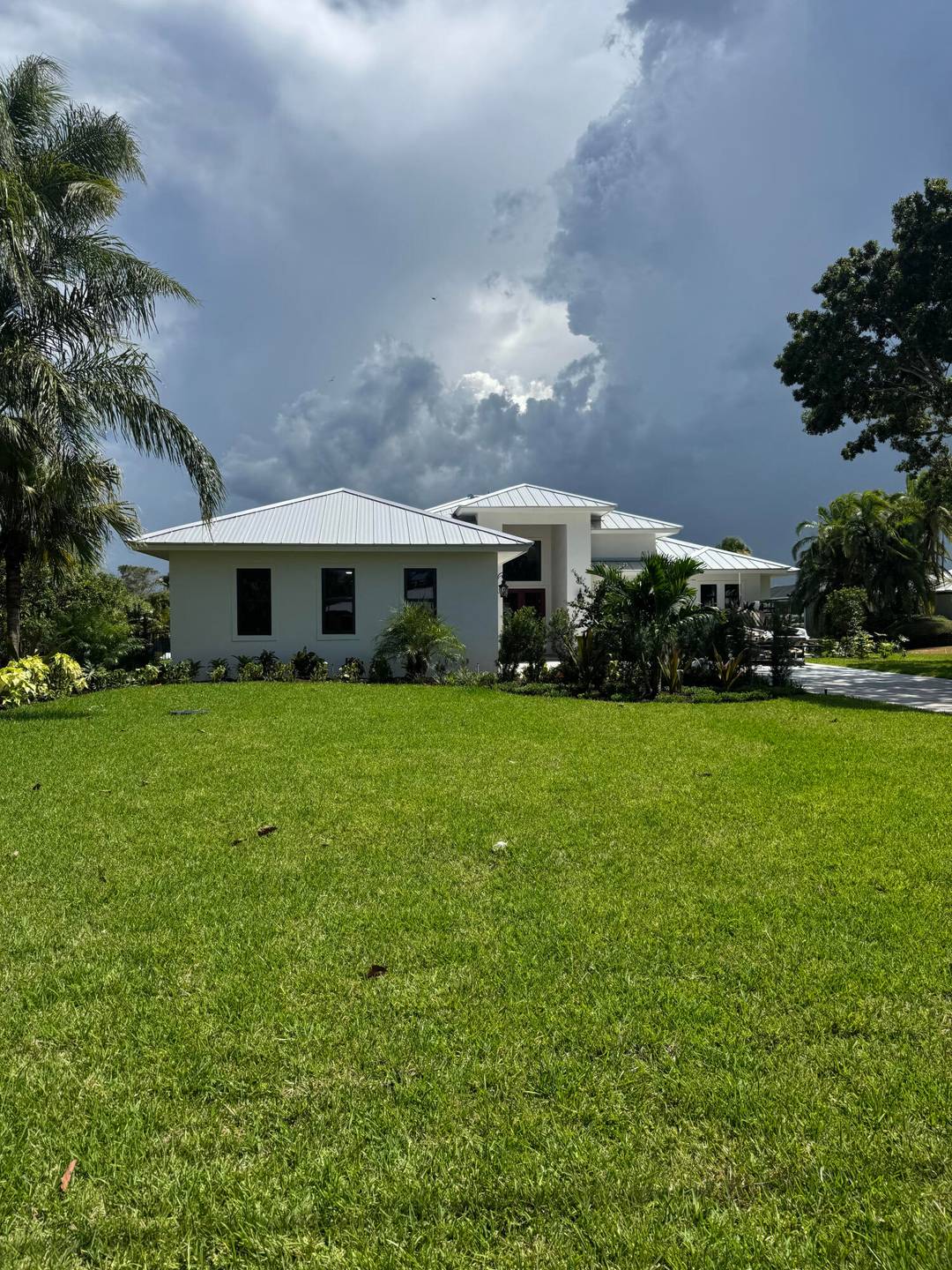 Discover unparalleled luxury in this Brand New home nestled on 100 feet of pristine waterfront with ocean access.