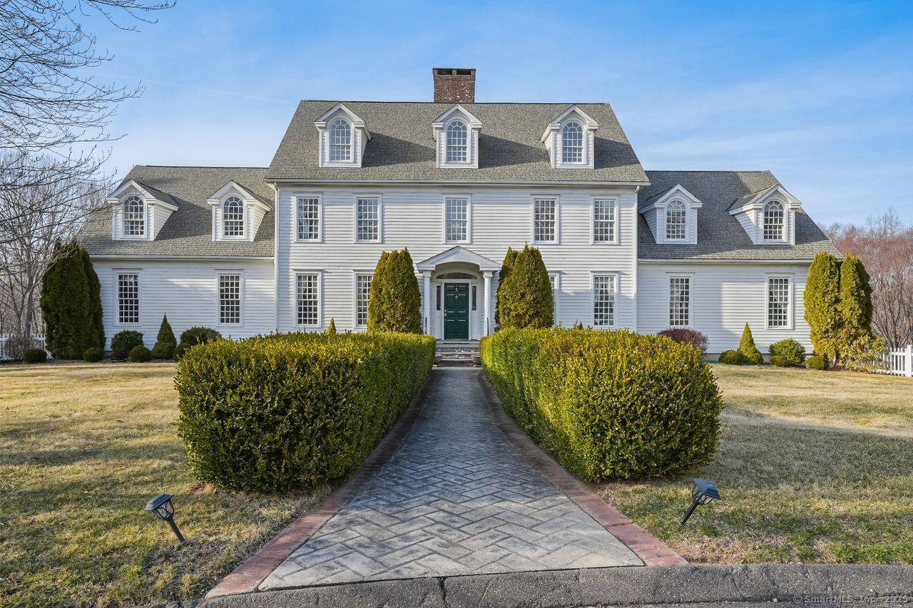 Experience luxury living in this exquisite and stately Federal style colonial tucked at the end of a cul de sac in Easton !