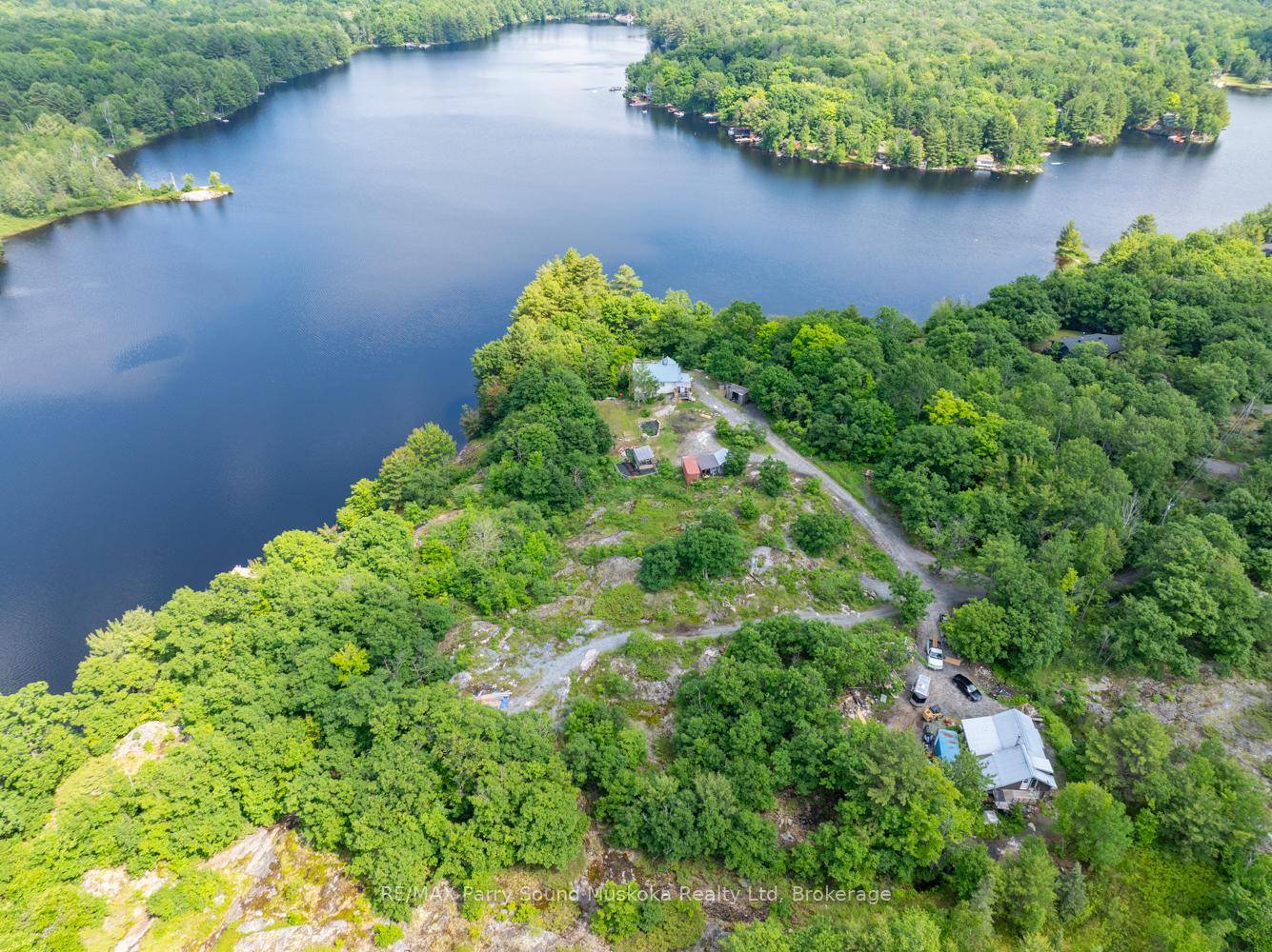 Enjoy this point of land with 800 feet of prime clean deep shoreline sitting on 15 acres in Muskoka.