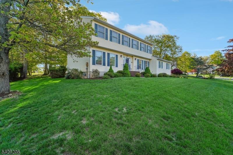 Welcome to this beautifully maintained 5 bedroom, 3 bathroom Colonial set on a manicured lot in sought after Oak Hill Estates.