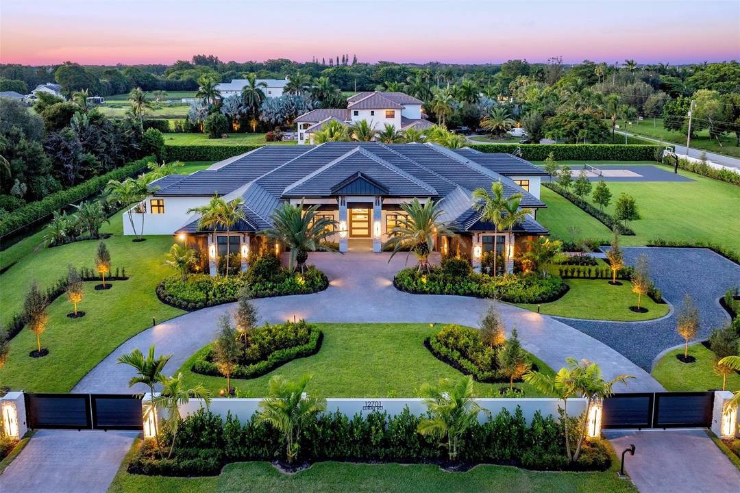 Luxury meets lifestyle in Southwest Ranches this design inspired estate offers 10, 000 SF of Indoor Outdoor living space amp ; sits on more than 2 acres.