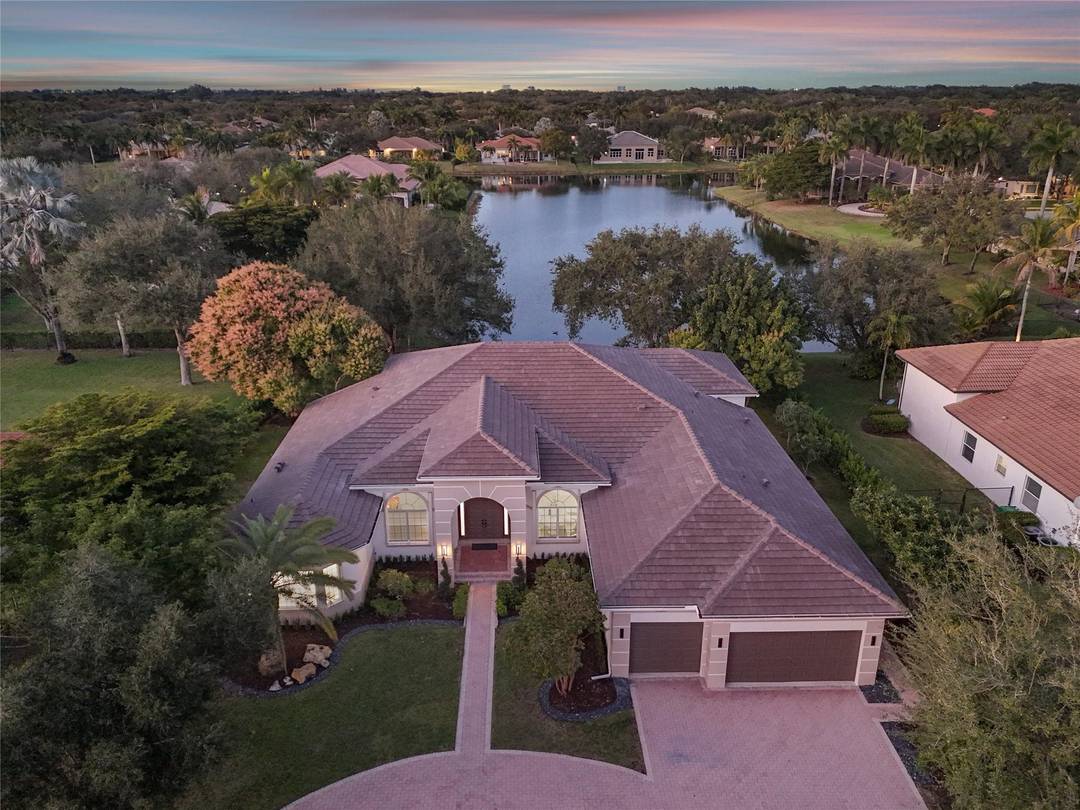 Prestigious man gated community of Imagination Farms, this stunning estate features over 4, 100 sq ft amp ; showcases the perfect blend of luxury, comfort, and fantastic water views.