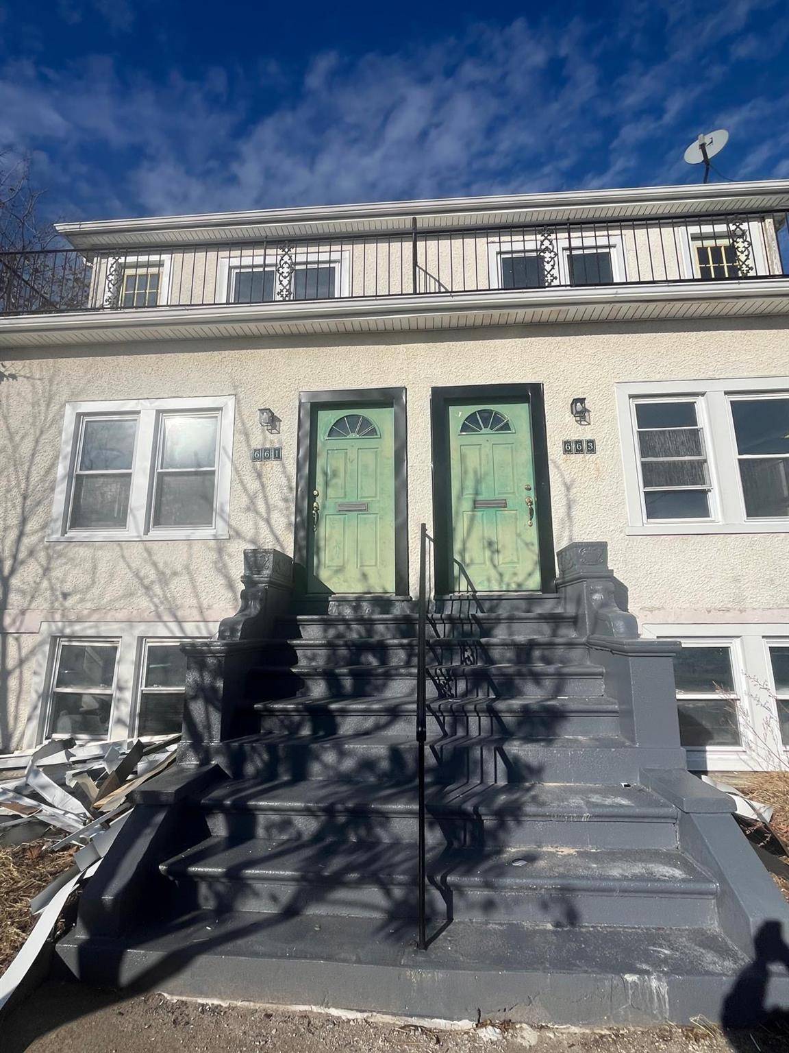 This expansive two family home offers a wealth of opportunity for both homeowners and investors alike.