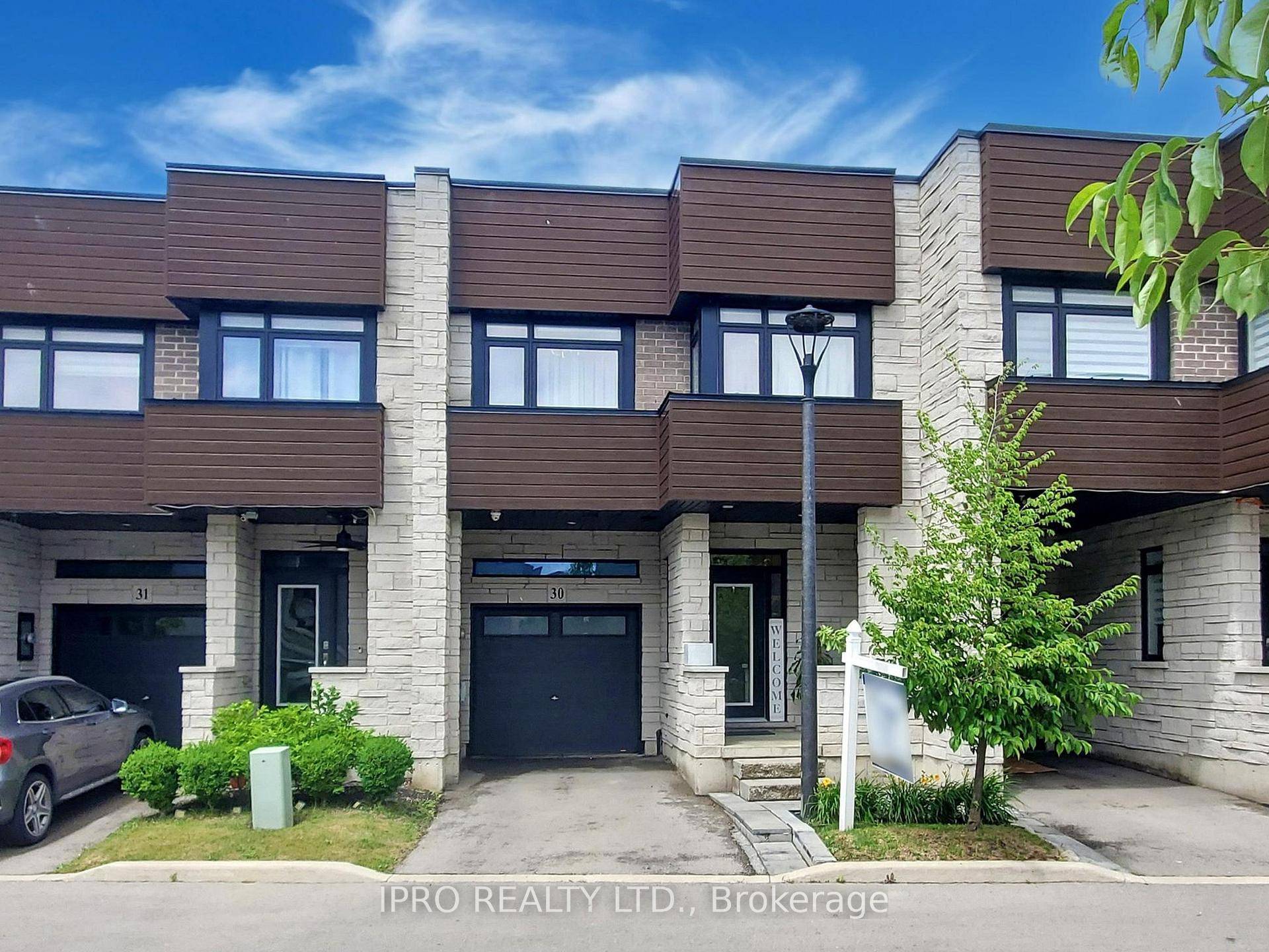 This exquisite executive townhome features 3 bedrooms and 4 bathrooms, combining modern luxury with functionality.