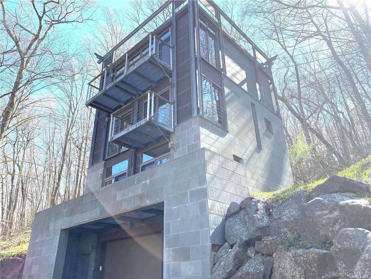 A truly unique, one of a kind treehouse retreat, this stunning three story home originally built in 2001 and thoughtfully updated offers an exceptional blend of modern comfort and natural ...
