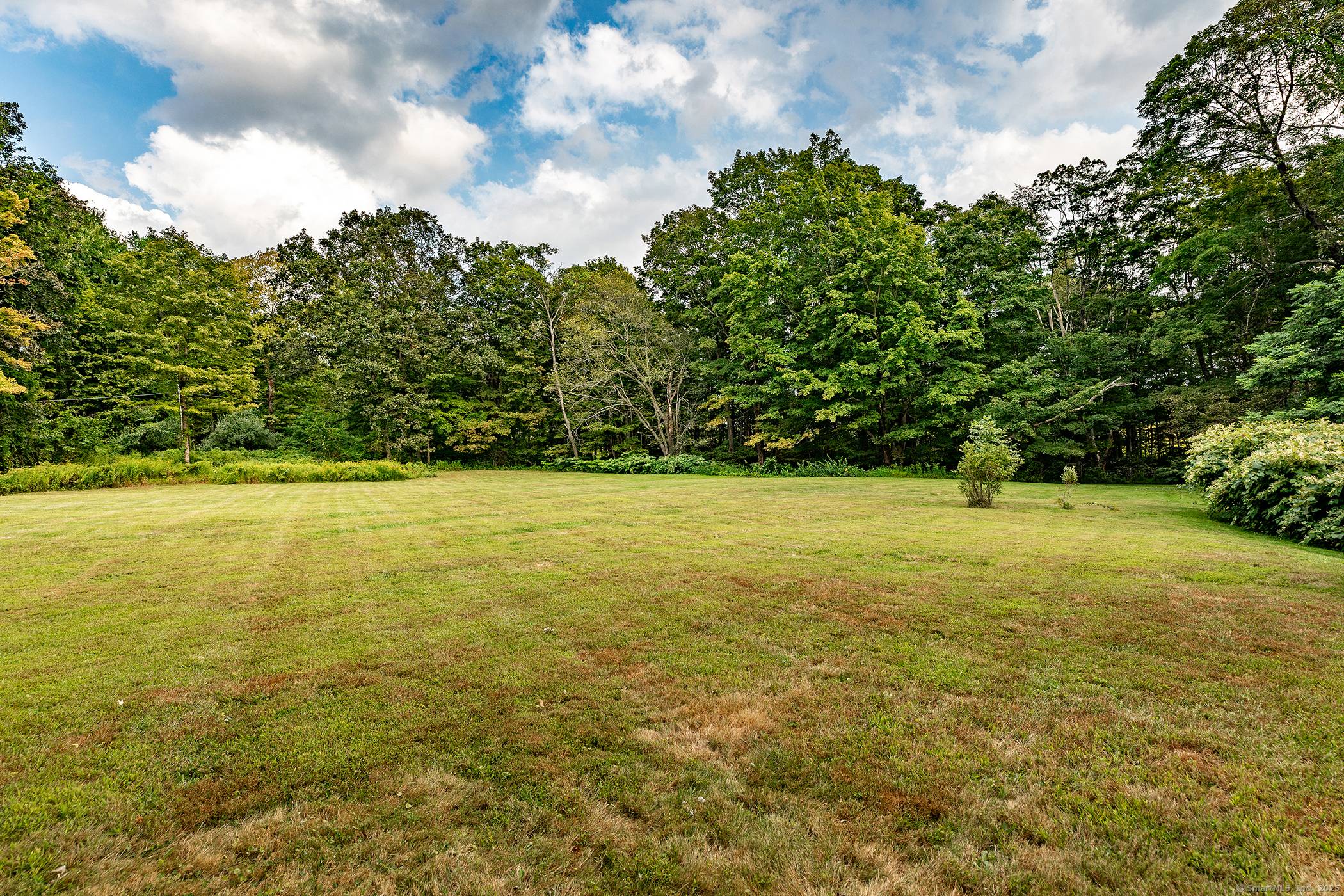 Classic Colonial with Historic Charm and Modern Potential Step back in time with this stunning 1880 Historic Colonial, formerly a working dairy farm and once owned by famed Harriet the ...