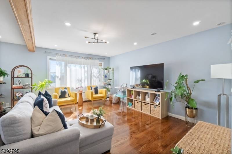 Welcome to this beautifully maintained, fully fenced in home featuring 3 bedrooms and 2 full bathrooms in the heart of Carlstadt.