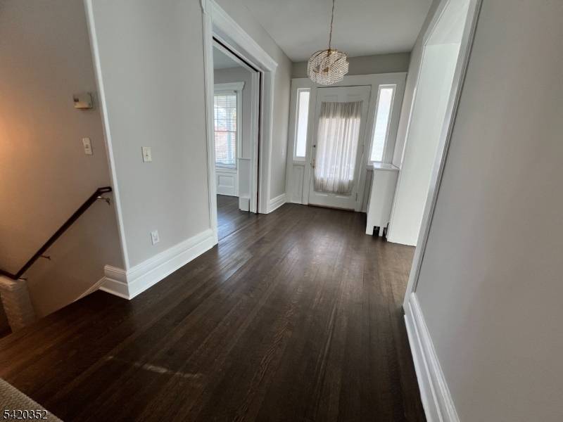 Lovely large traditional victorian with gourmet kitchen, ss appliances, good size bedrooms, a full bath on both floors and half bath in finished basement.