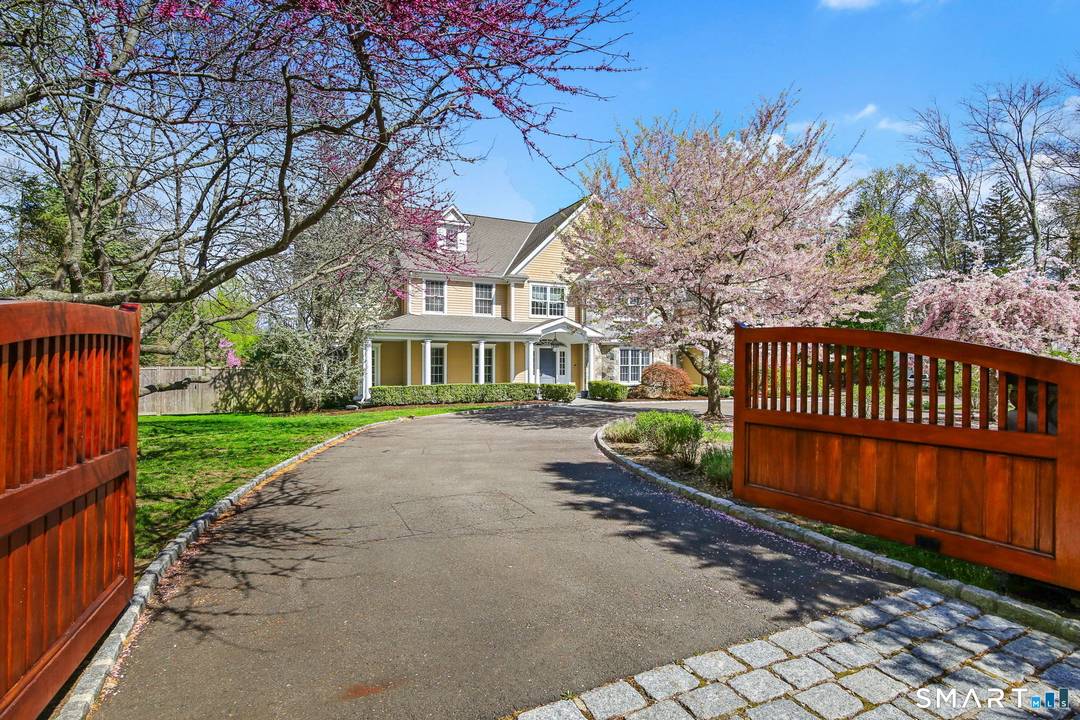 Minutes to the the heart of New Canaan and walk to Waveny Park from this beautifully updated Colonial in a prime location.