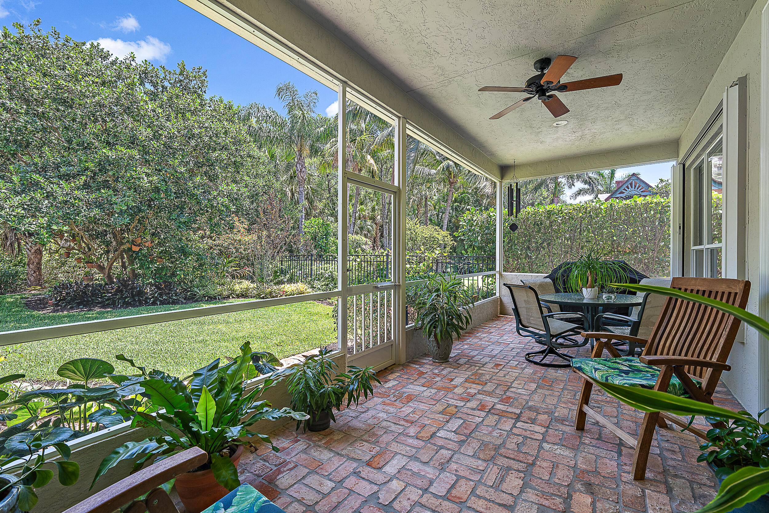 Located in the secured gated and much sought after Sanctuary community this one story residence backs to the nature preserve offering a very private and intimate setting.