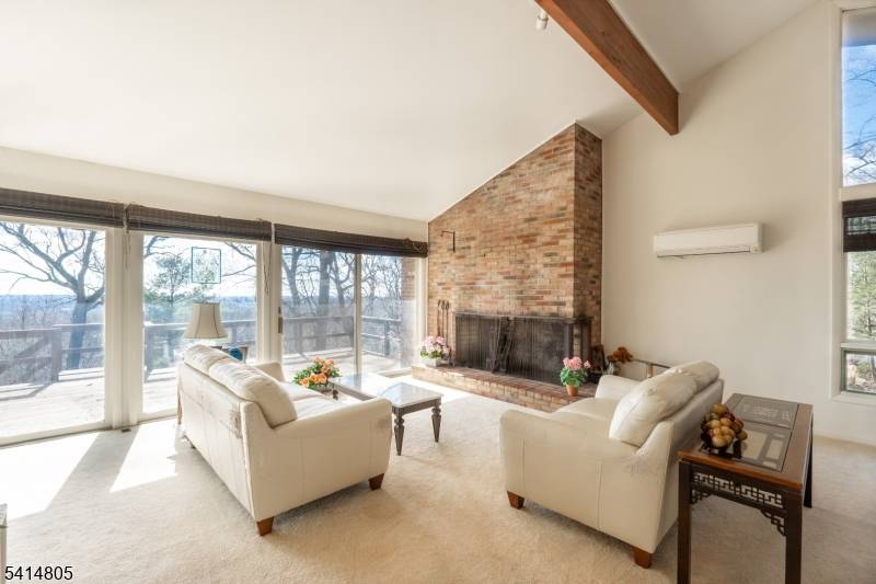 Raised Ranch in desirable Parsippany offering breathtaking views of the New York City from the expansive rear deck.