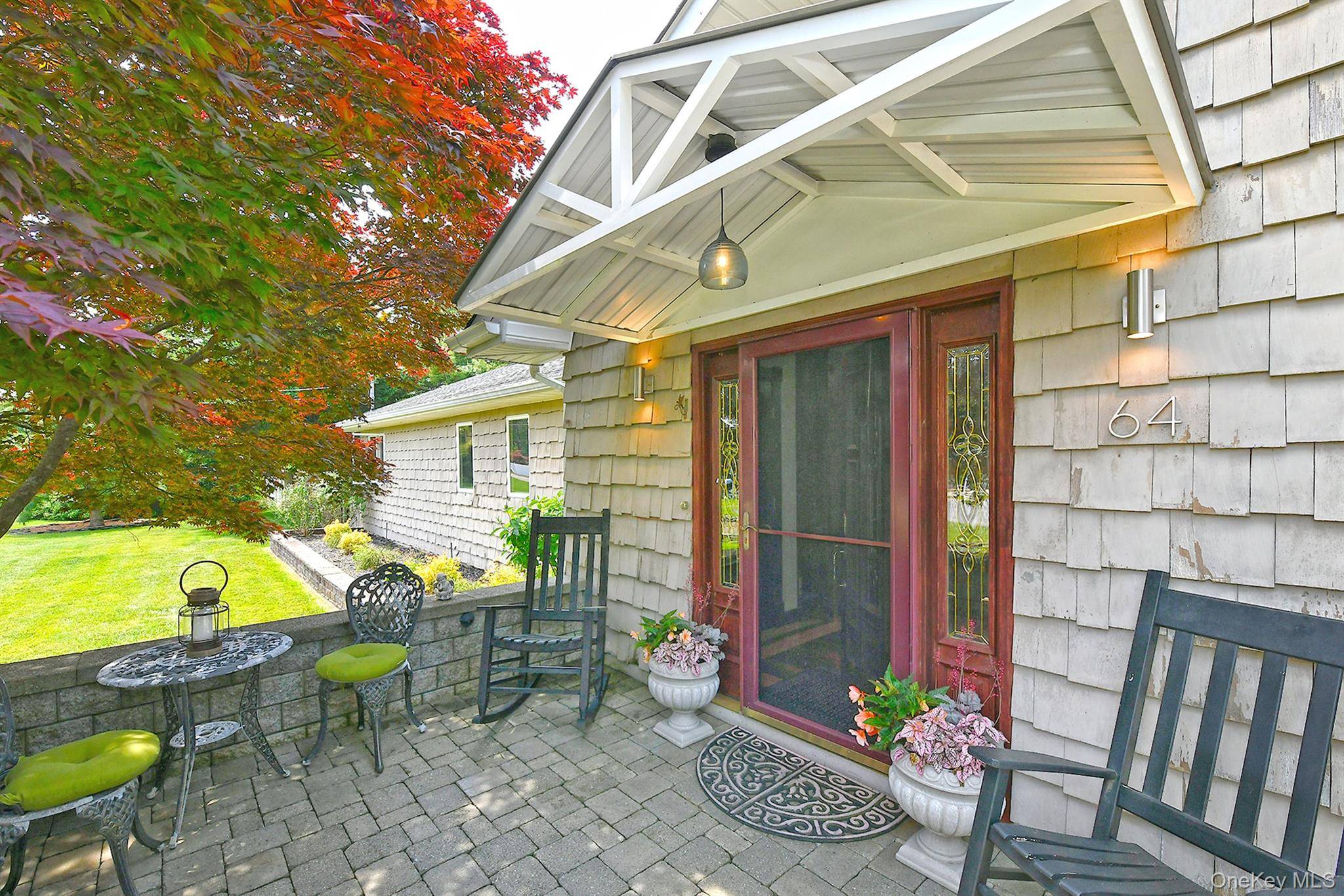 Sprawling Bellport Ranch Retreat Welcome to 64 Champlin Avenue a rare and remarkable find nestled just outside the heart of Bellport Village.