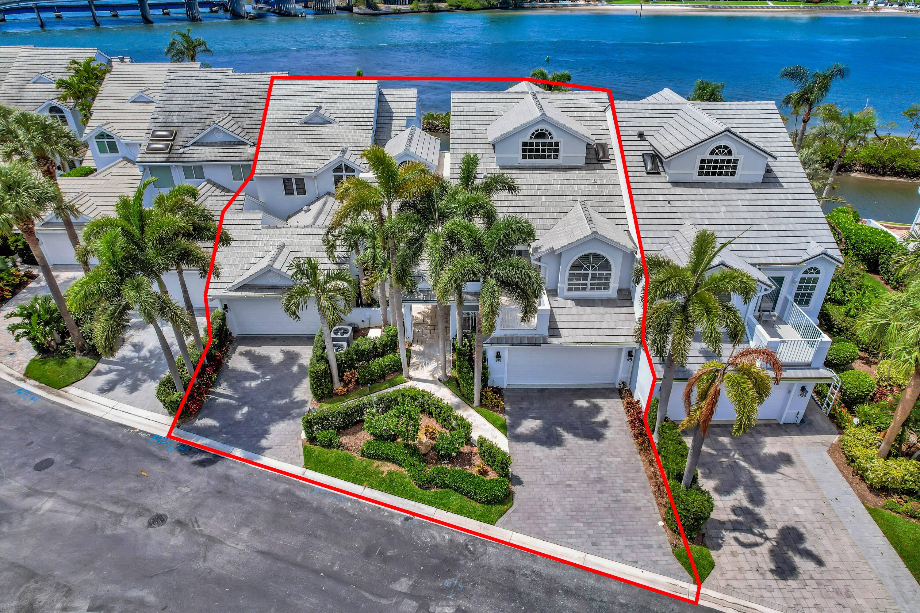 Located along 90 ft of pristine Intracoastal Waterway, this extraordinary 5, 200 sq ft residence is a one of a kind gem in Jupiter, Florida.