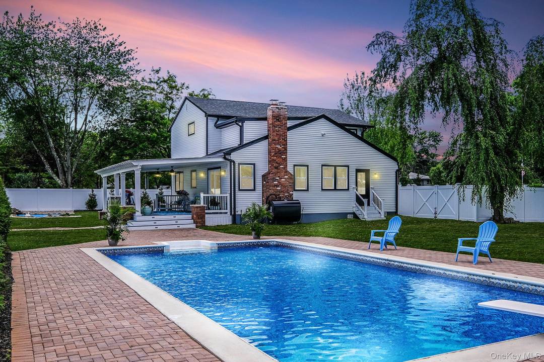 This exceptional Dix Hills residence offers near new construction quality with thoughtfully curated luxury throughout.