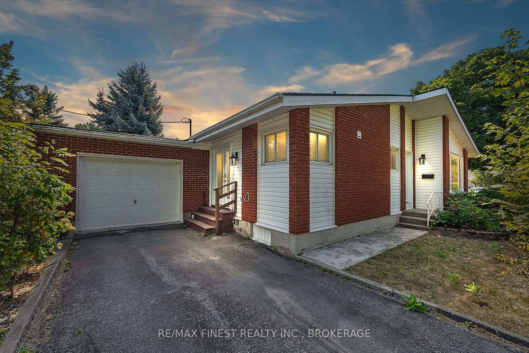 Welcome to this centrally located 3 2 bedroom, 2 bath bungalow with an attached garage, tucked away on a quiet street in Calvin Park.