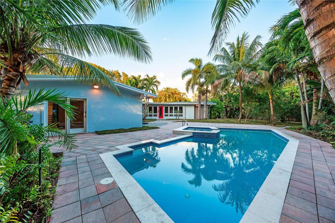Do not miss an opportunity with rare DOUBLE LOT situated in Fort Lauderdale s most sought after neighborhood, this expansive property offers true indoor outdoor living within walking distance to ...