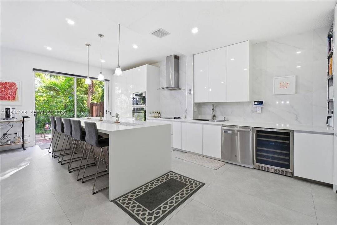 Beautifully upgraded home in the exclusive Doral Isles community !