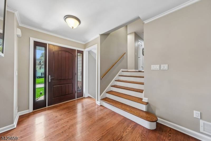 Experience the perfect harmony of modern upgrades and timeless charm at 23 Crestview Avenue, an impeccably maintained residence in a coveted Madison Hill neighborhood.