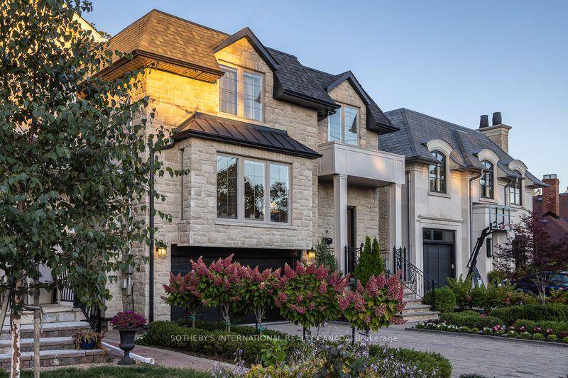 Stunning 4 1 bed, 5 bath custom home nestled on a quiet street in one of East Yorks most desirable pockets, with Taylor Creek Park just steps away.