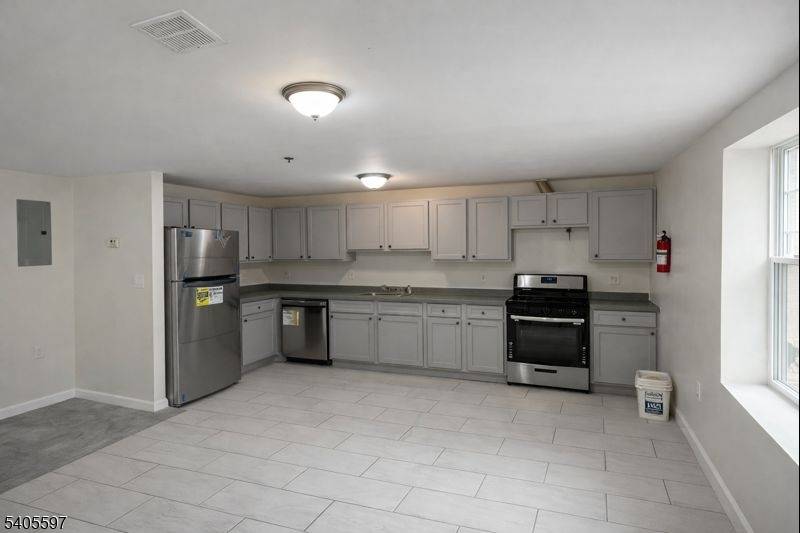 Massive Three Family Home in the Heart of Newark.