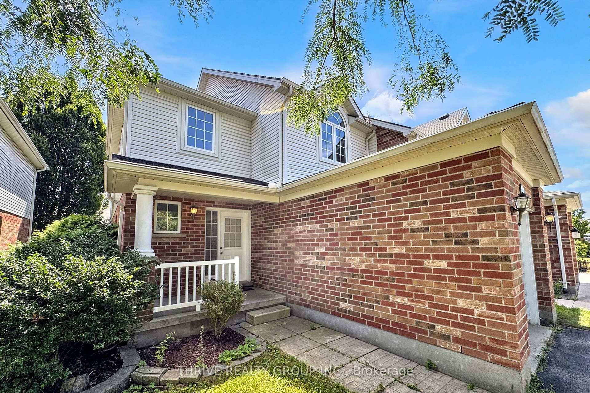 Beautifully maintained end unit freehold townhome in sought after Northwest London !