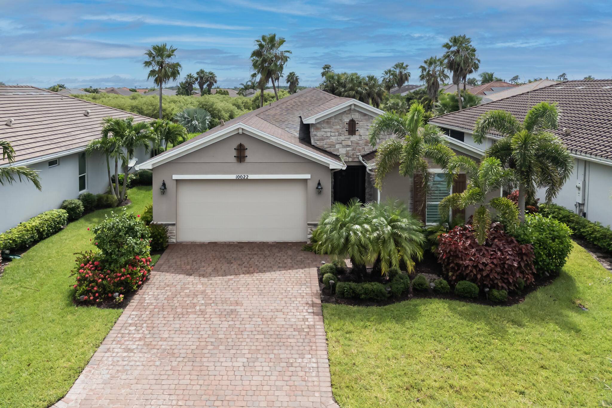 Welcome to this meticulously maintained 2 bedroom, 2 bath home with a versatile den office, located in one of Tradition's premier active adult communities.