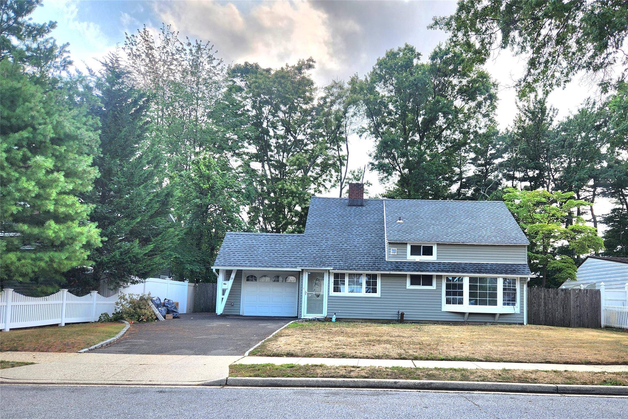 Welcome to this beautifully updated single family house in the heart of Hicksville !
