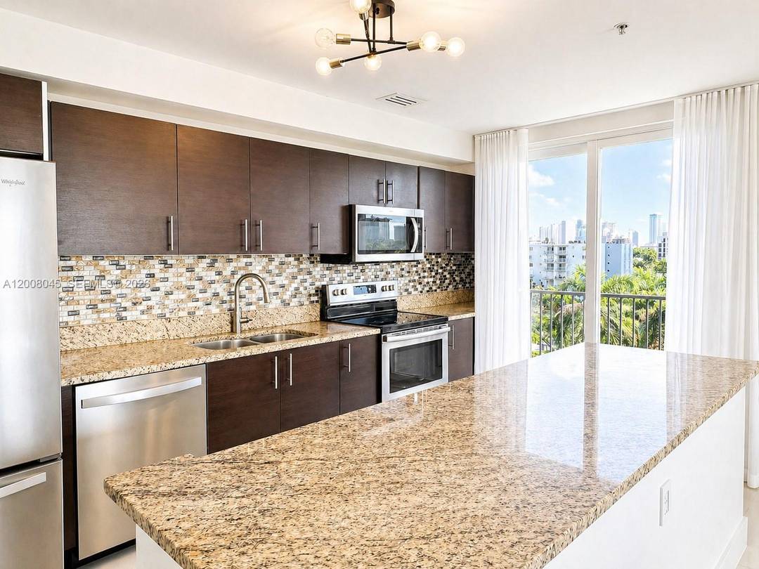 Discover comfort and convenience in this beautifully maintained 2 bedroom, 2 bathroom corner residence, the largest layout in this charming boutique building.