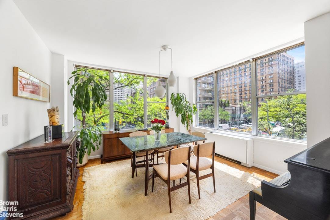 Spacious 2 bedroom 2 bathroom with oversized windows and the prettiest tree top views in the heart of the Upper East Side.