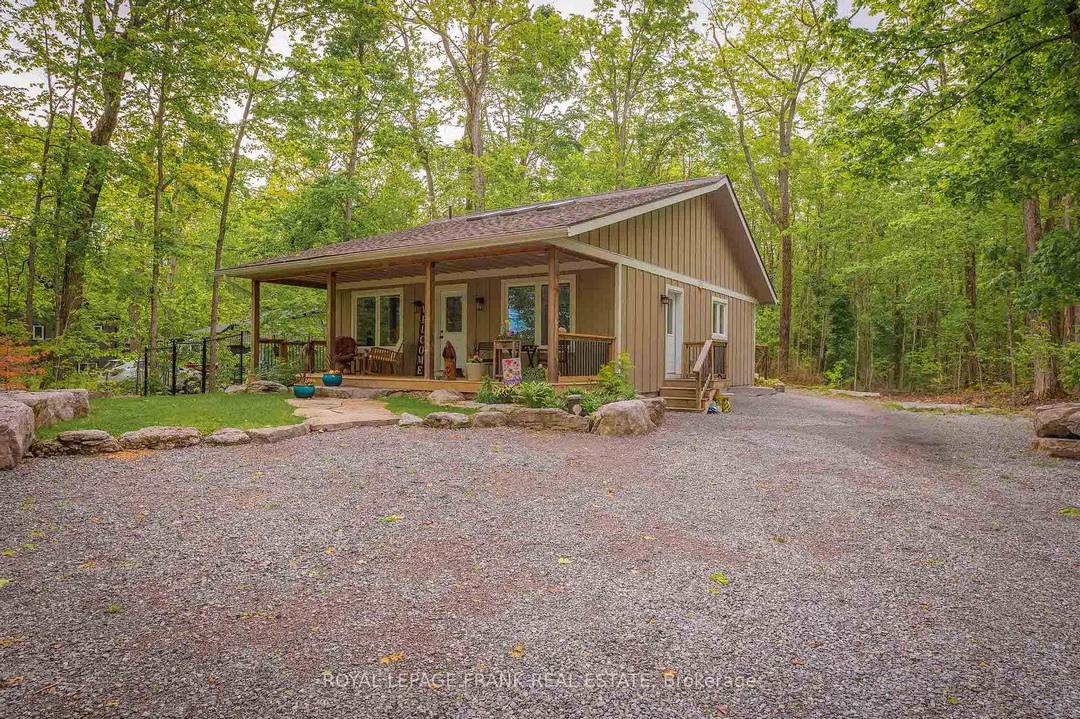 Lovely custom bungalow located a short walk to a public access on Pigeon Lake.