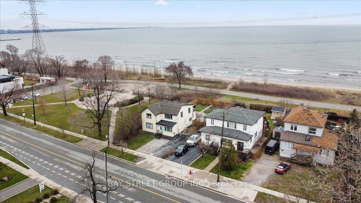BEACHFRONT 2 UNIT PROPERTY WITH WATERFRONT TRAIL ACCESS A RARE OPPORTUNITY !