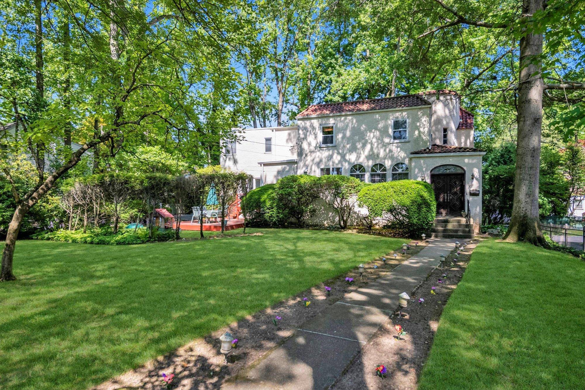 Charming Mediterranean Gem in the Heart of Great Neck Village Overflowing with charm and character, this beautiful stucco home is nestled on a spacious park like 100 x 125 lot ...