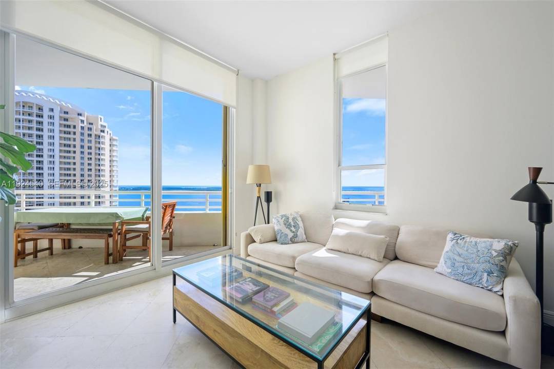 This Lower Penthouse at One Tequesta Point features a 2 bedroom, 2 bath layout with three balconies that showcase stunning views of Biscayne Bay and the Brickell skyline.