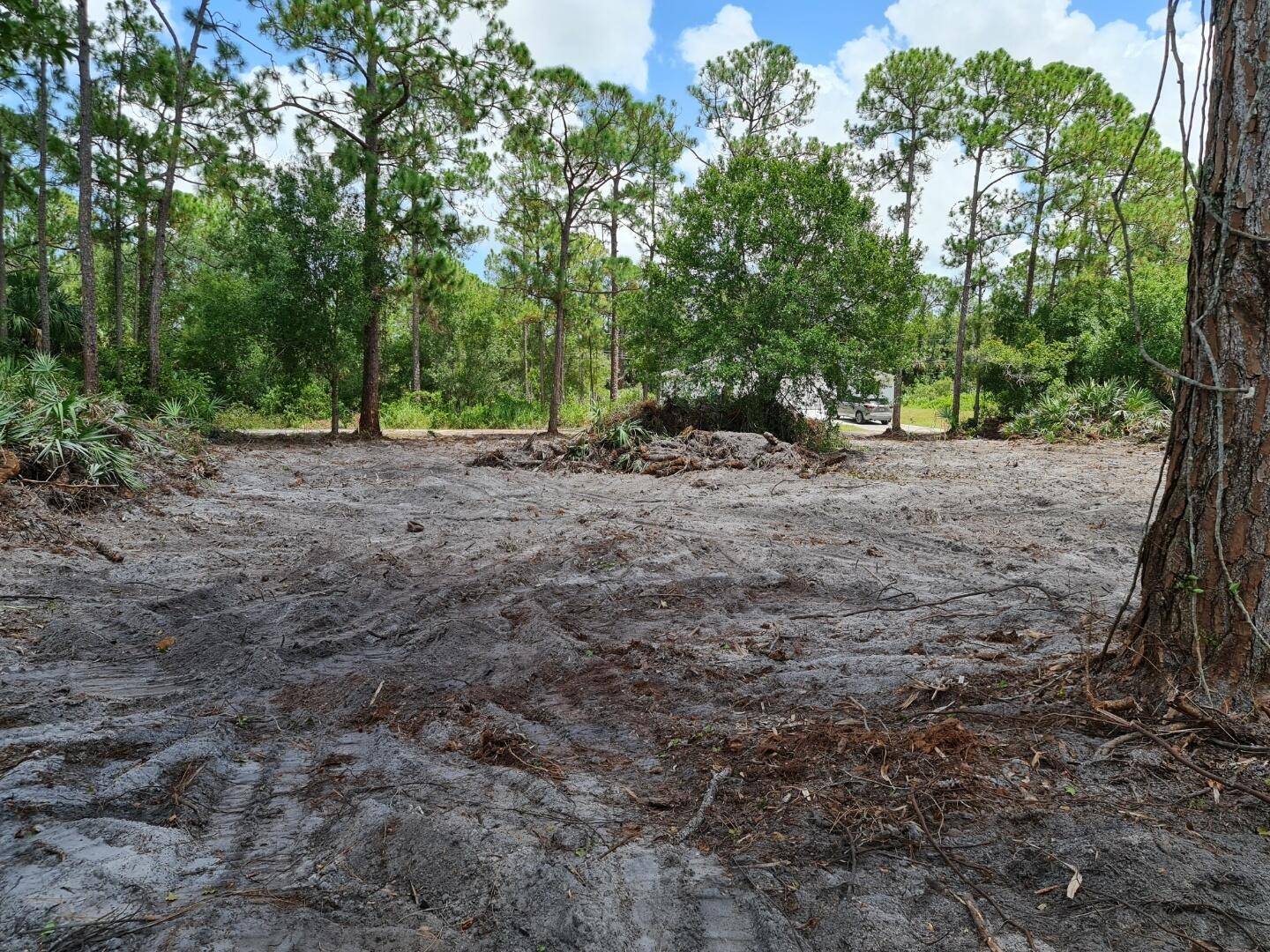Cleared lot on private road no HOA close to schools, coffee shop, restaurants and Tractor Supply.