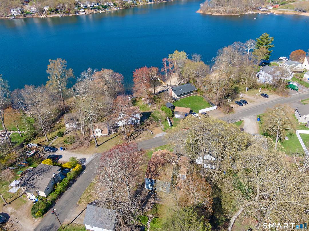 Welcome to this charming 3 4 bedroom, 2 full bath home in the desirable Coventry Lake area !