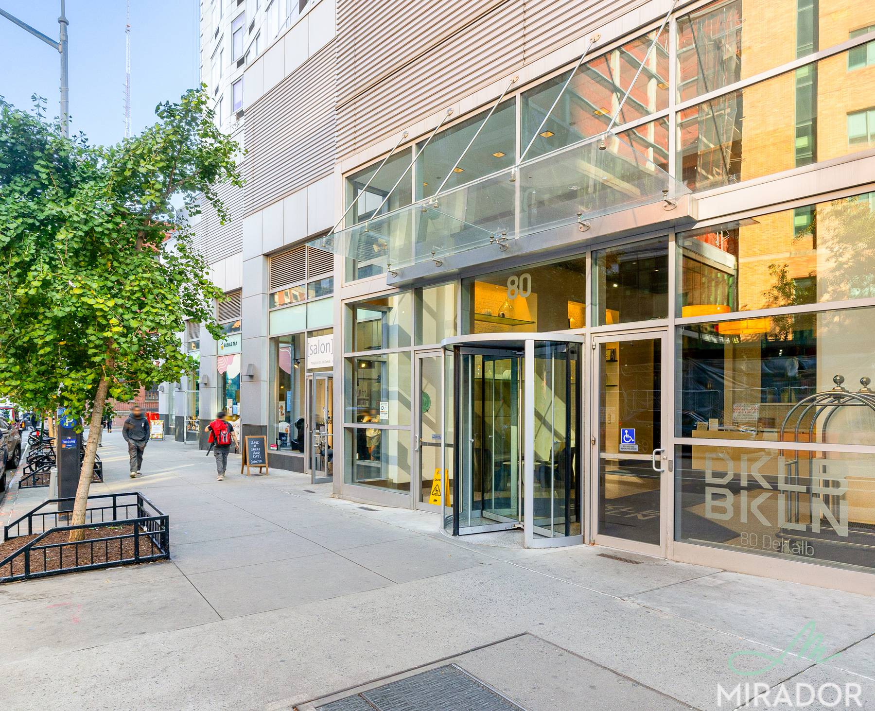 A groundbreaking green building with a striking glass and metal facade, 80 Dekalb rises 36 stories in the heart of Fort Greene, at the intersection of downtown and brownstone Brooklyn.