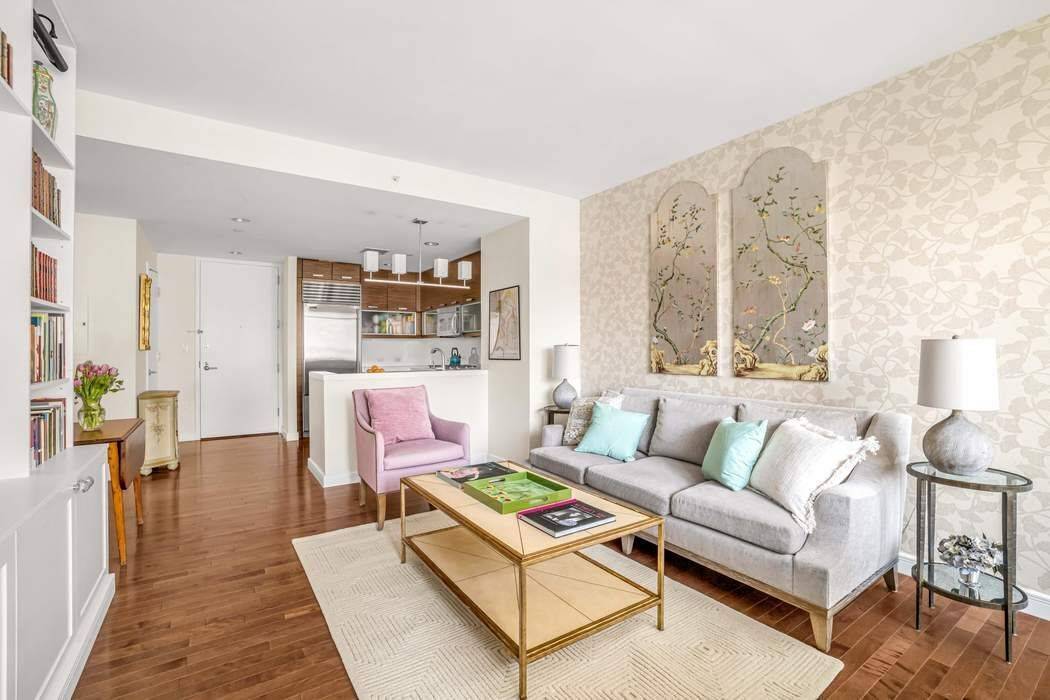 A chic, move in ready corner unit with an open layout, dramatic northwest city views, and sunset skies that stop you in your tracks.