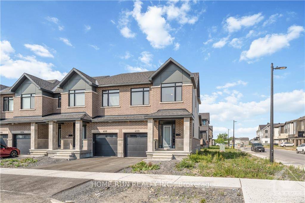 Welcome to this exceptional end unit, a true gem that bathes in abundant natural light, accentuating its charming and charismatic features.