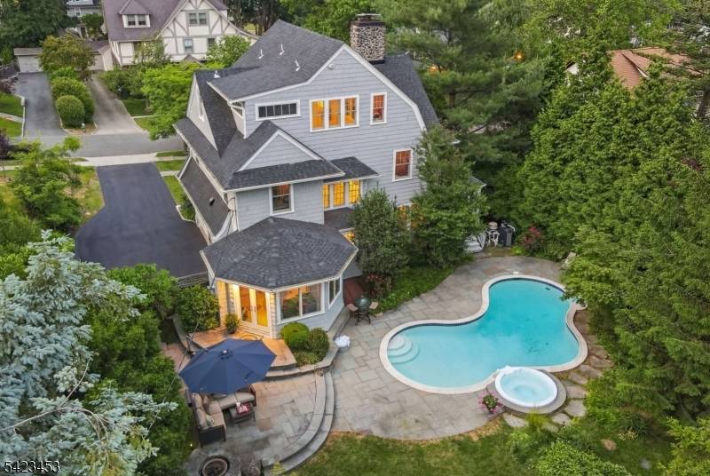 Turnkey, design forward living with a refined modern aesthetic, ideally positioned between 157 acre Mills Reservation and Iris Mountainside Park Iris Gardens, just a few blocks from Upper Montclair Village ...