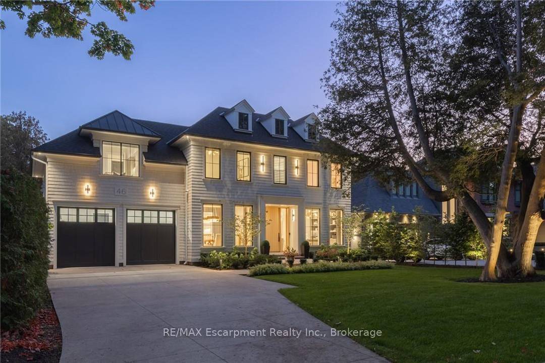 Walk to downtown Oakville from this 2024 custom built residence, third house from Lake Ontario on a 65 x 158 lot south of Lakeshore.