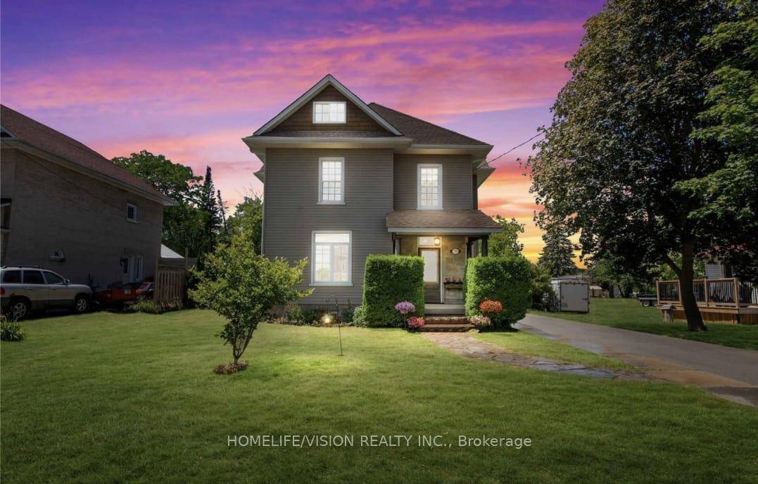 Welcome to this exquisite century home, where old world charm meets modern sophistication.