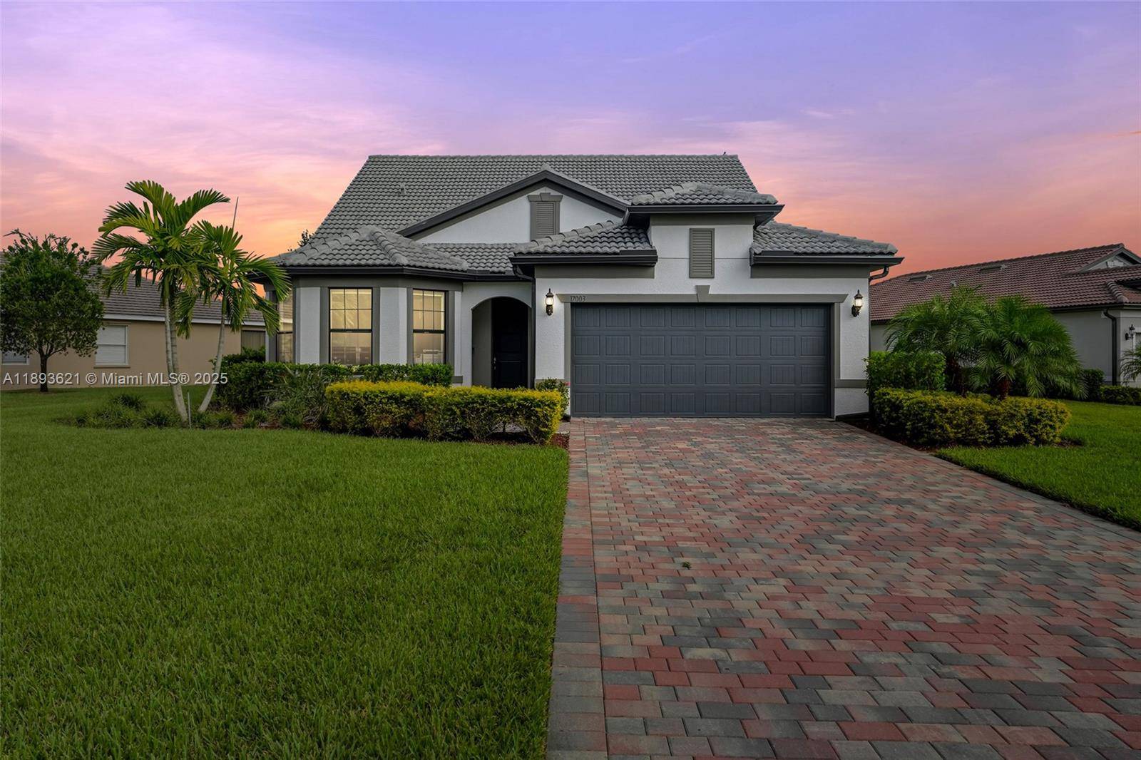 Discover elegant Florida living in this spacious 3 bedroom den, 3 bath home in the desirable, gated River Hall Golf amp ; Country Club community in Alva, FL !